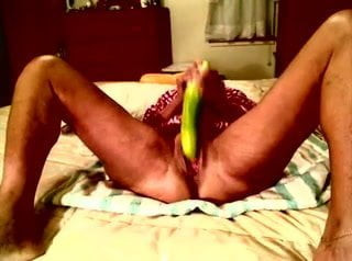 Granny amateur using a huge cucumber, cuming and squirting